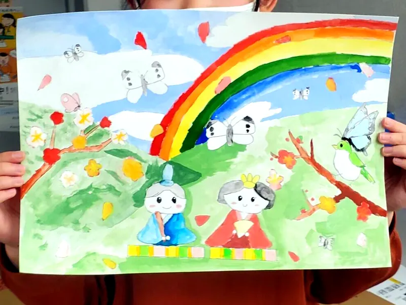 子供が描いた虹と動物たちの絵